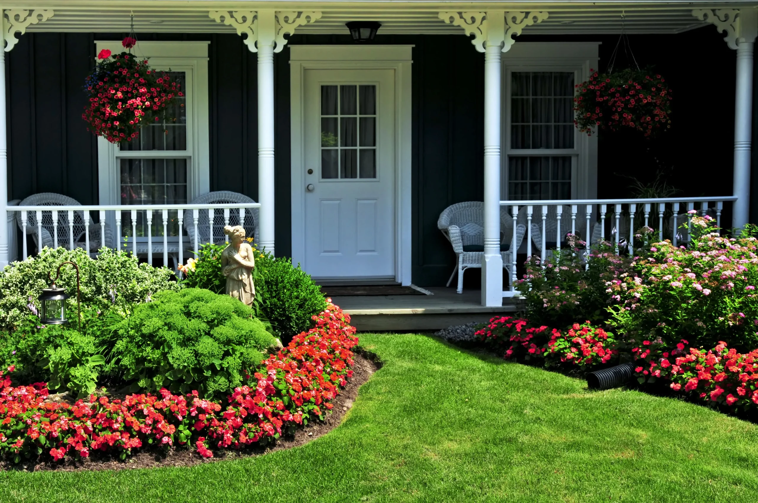 Commercial and home landscaper maintaining pristine lawn turf and shrubbery in Clive, IA